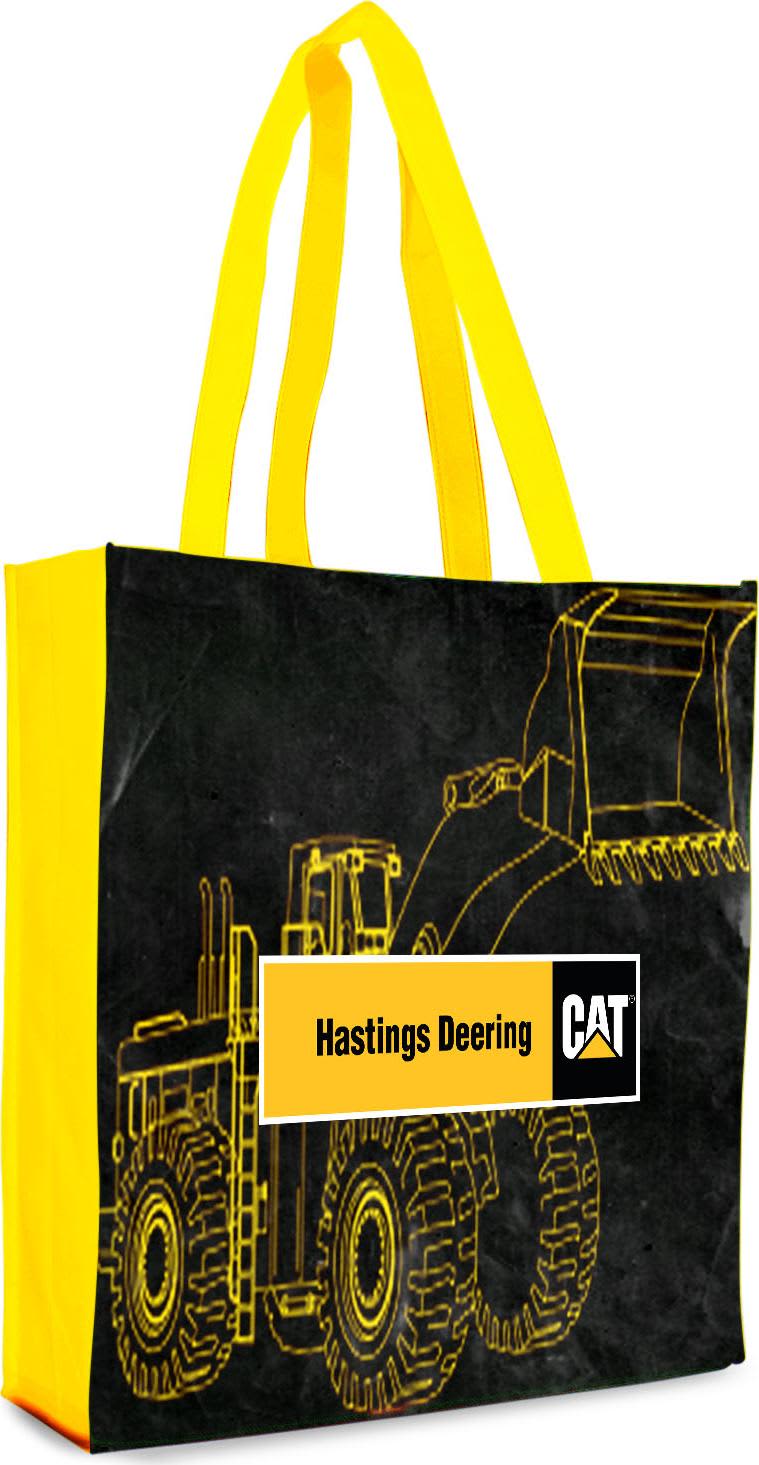 A black tote bag featuring a yellow design of heavy machinery, with yellow handles and a branded logo. Kansas Laminated Tote Bag - Image 1