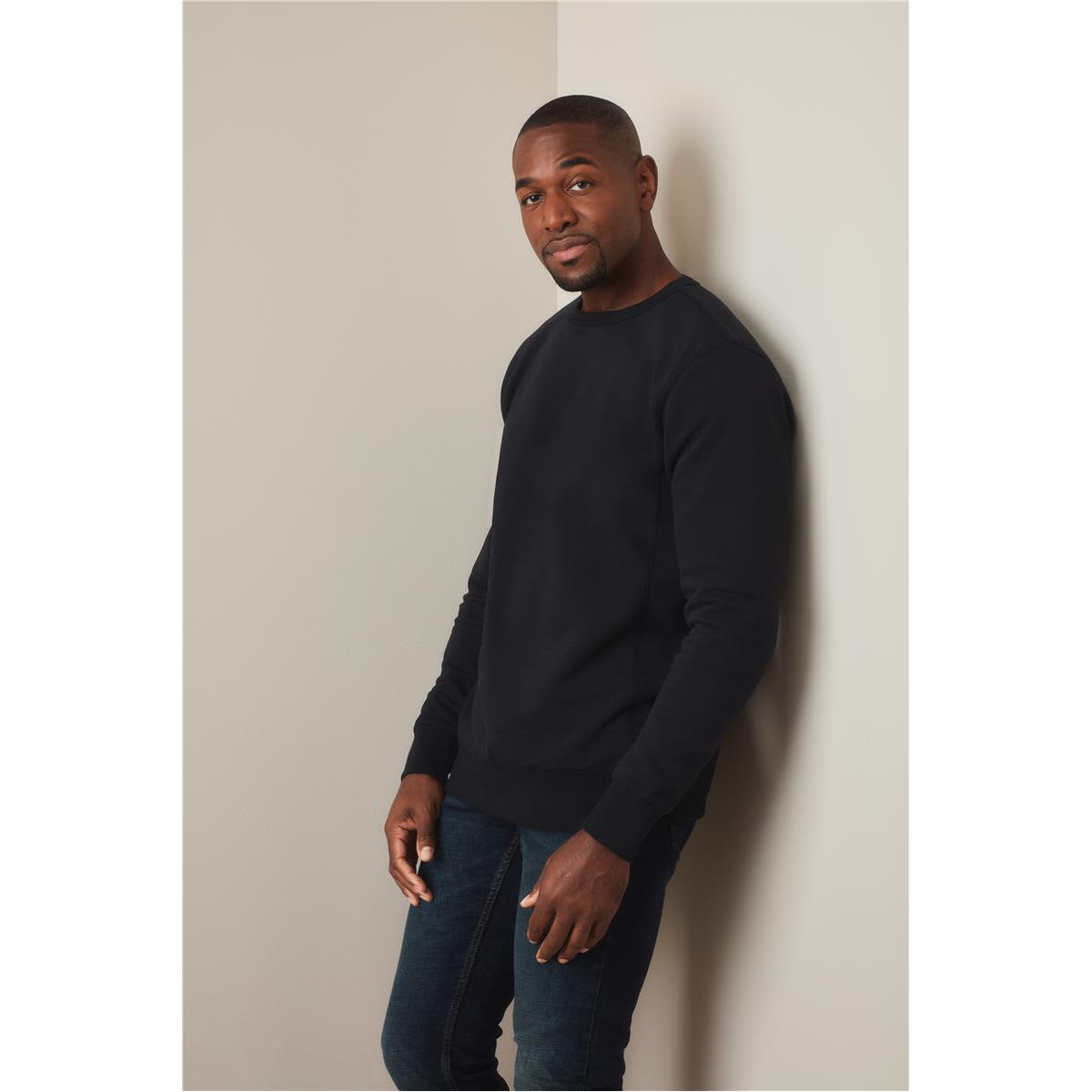 A black men's active sweatshirt displayed on a model against a neutral background. The product features a logo. Men's Active Sweatshirt - Image 1