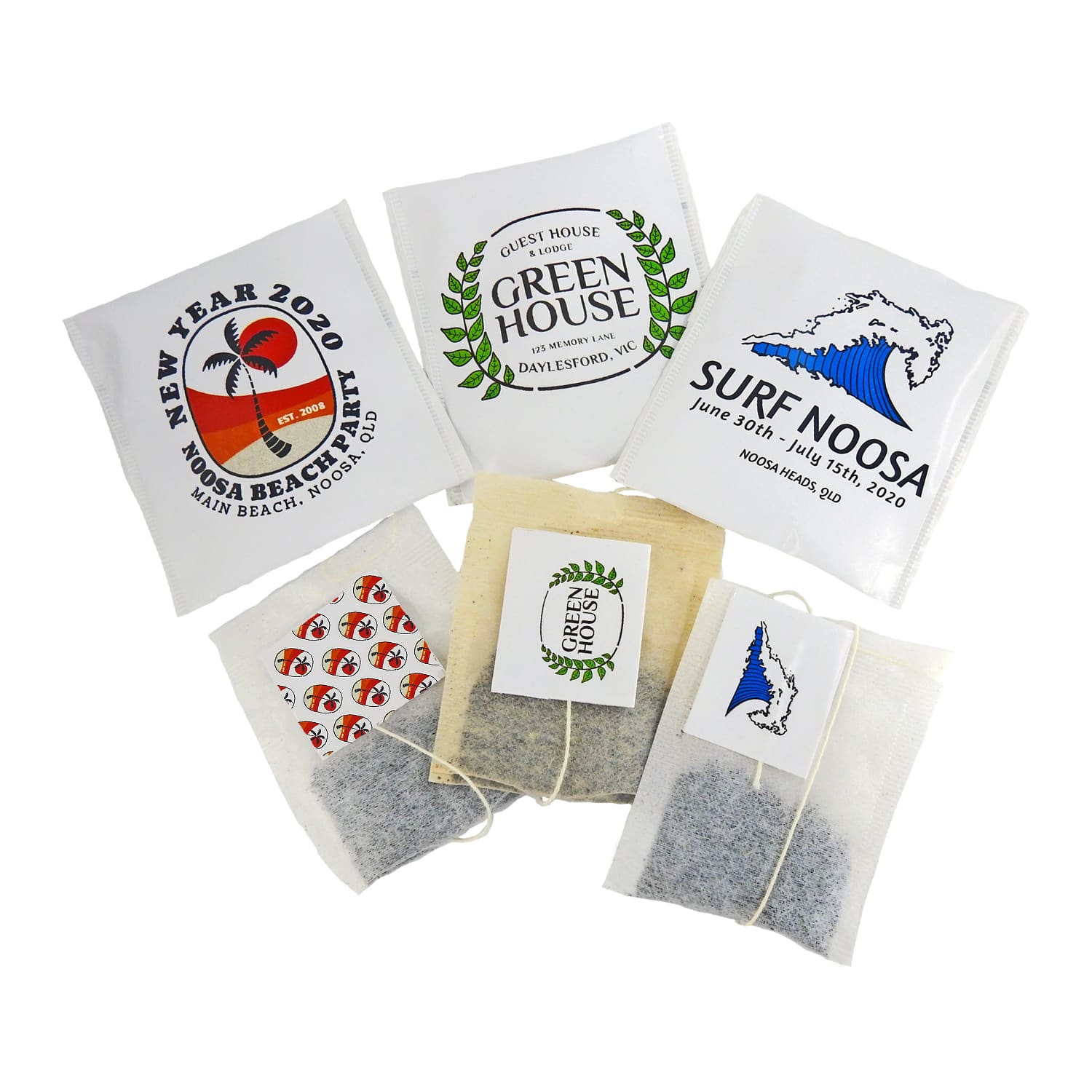 A selection of tea envelopes in various colours, featuring different designs and a logo on some packets. Tea Envelope - Image 1