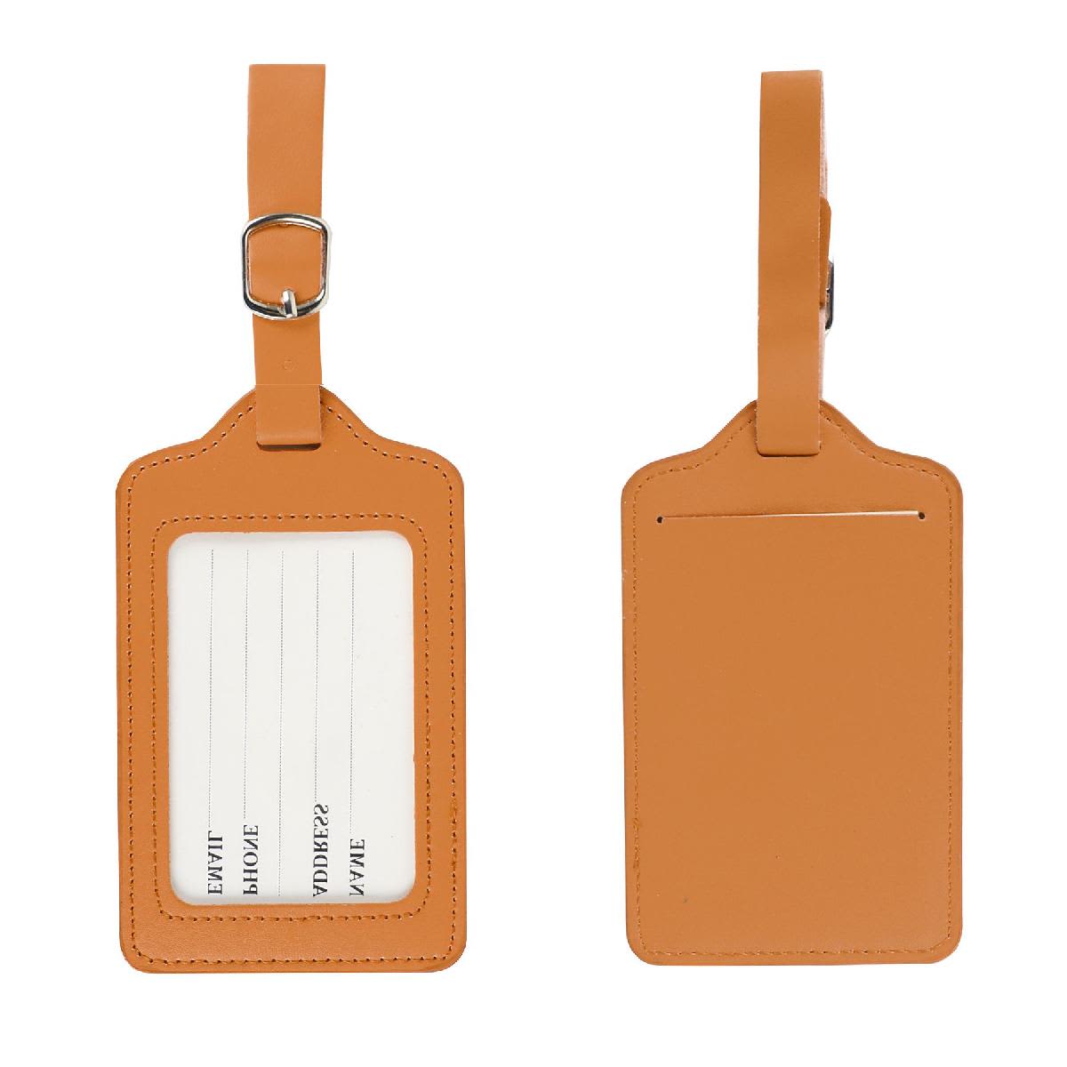 A set of PU leather luggage tags in a warm tan colour, featuring a sleek design with slots for information cards. PU Leather Luggage Tags - Image 1