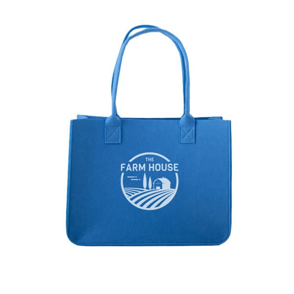 A blue felt tote bag with long handles and a logo printed on the front. Personalized Felt Tote Bag With Long Handle - Image 1