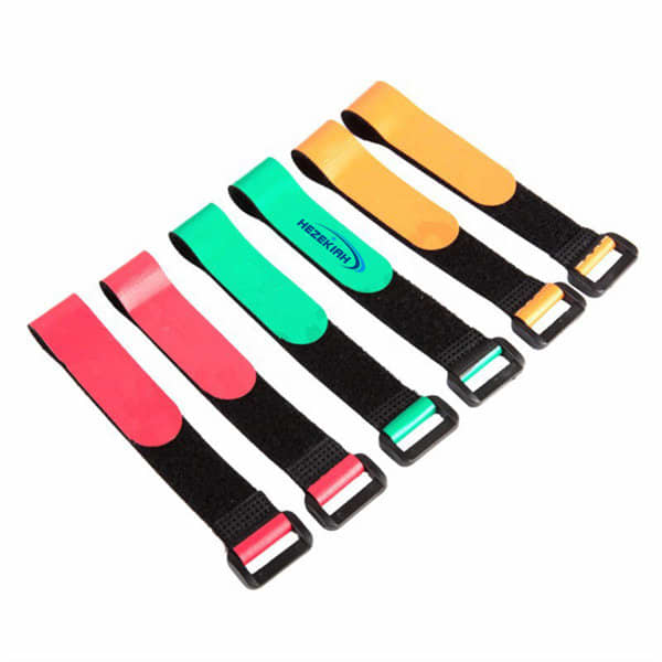 A set of hook loop straps in red, green, orange, and black, featuring buckles and one logo. Hook Loop Strap With Buckle - Image 1