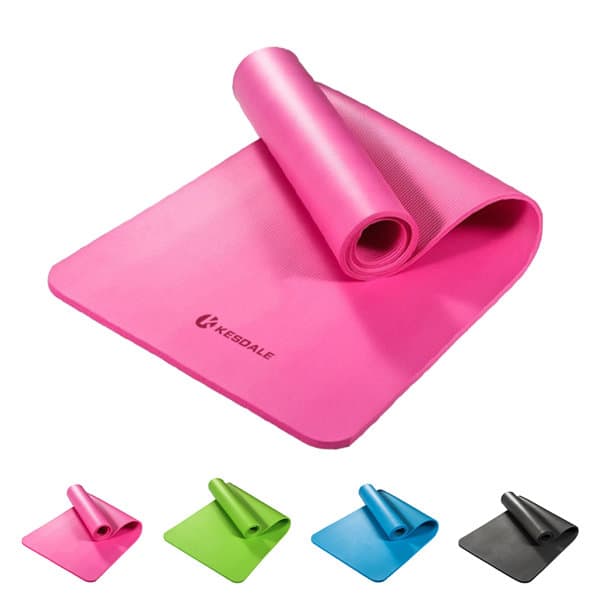 A pink portable non-slip yoga mat rolled up, with black, blue, and green mats shown below. The mat has a logo. Portable Non Slip Yoga Mat - Image 1