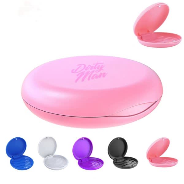 A pink orthodontic retainer case with an interior lid, alongside cases in purple, white, and black. Orthodontic Retainer Case - Image 1