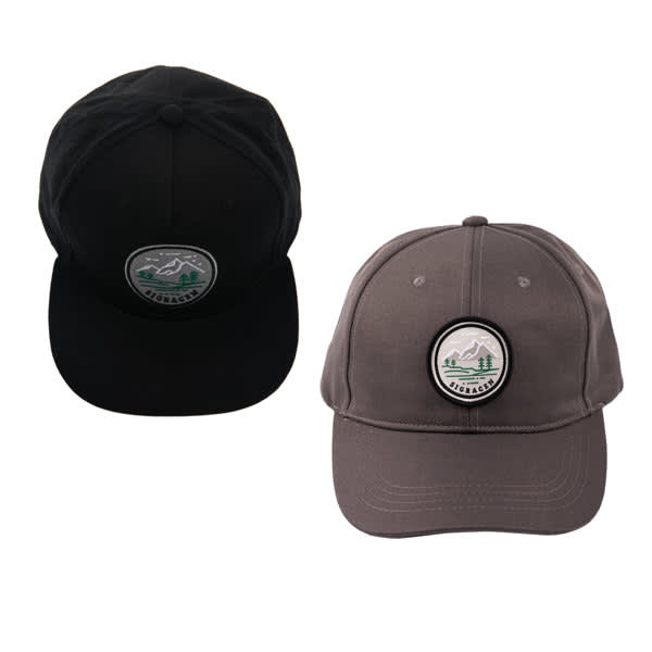 Two baseball caps are displayed, one black and one grey, each featuring a circular logo on the front. Customize Baseball Cap - Image 1