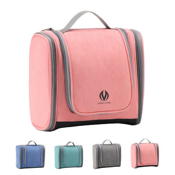 An extra large hanging travel toiletry organiser bag in pink, with grey accents and a logo on the front. Available in other colours. Extra Large Hanging Travel Toiletry Organizer Bag - Image 1