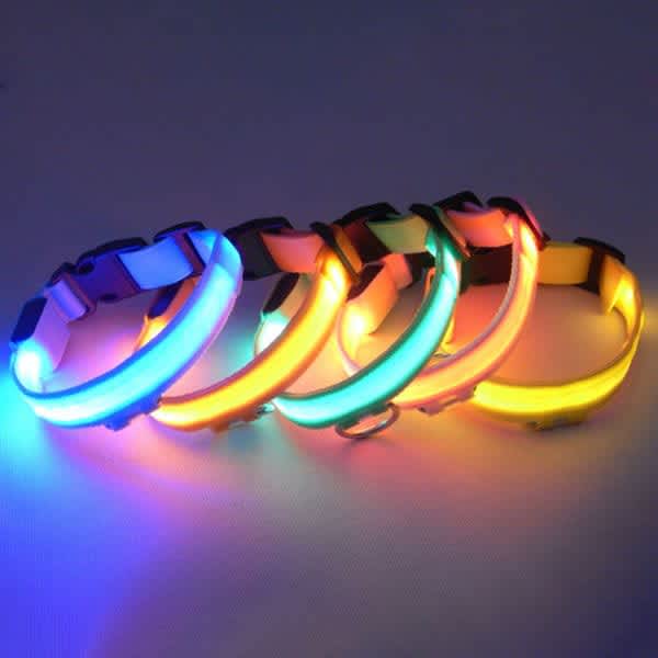 A collection of LED dog collars in various colours including blue, green, yellow, and orange, featuring a logo. LED Dog Collar - Image 1