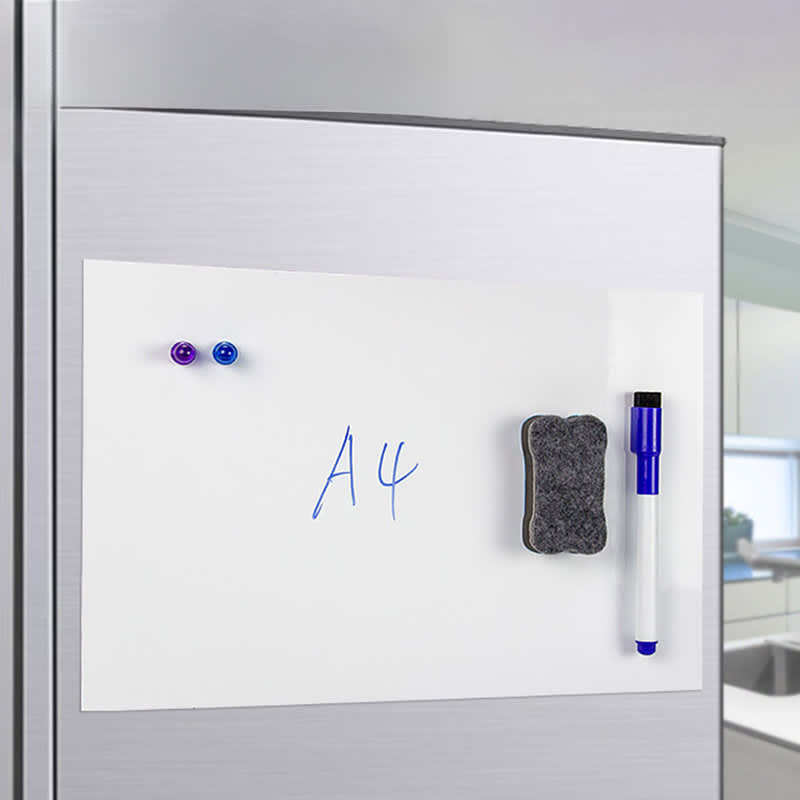 A white A3 magnetic whiteboard with a blue marker, eraser, and two purple magnets on a metallic surface. A3 Magnetic Whiteboard Set - Image 1