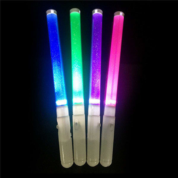 Four handheld LED glow sticks in blue, green, pink, and purple with clear tubes, featuring white bases and a logo. Handheld LED Glow Stick - Image 1