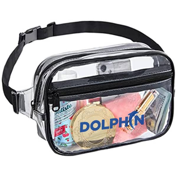 A clear, black-belt bag with a zippered closure, featuring various items inside, including a gold coin and personal items. Stadium Approved Clear Belt Bag - Image 1