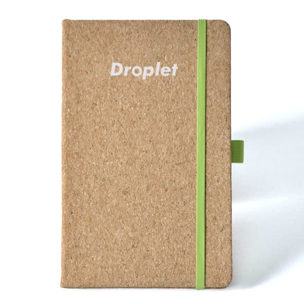 A cork notebook with a green elastic band and a logo on the cover. Suitable for office and business use. Eco-friendly A5 Cork Notebook - Image 1