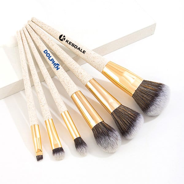 A biodegradable wheat straw makeup brush set featuring five brushes with gold detailing and soft bristles. 6 Pcs Biodegradable Wheat Straw Makeup Brush Set - Image 1