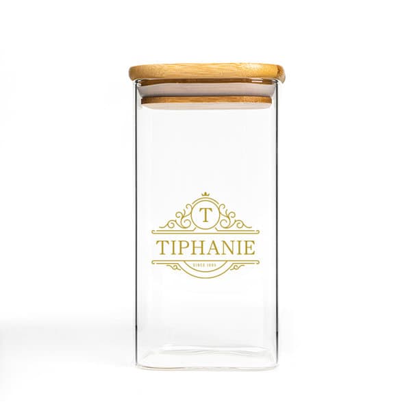 A clear high borosilicate glass storage tank with a wooden lid and decorative logo design. High Borosilicate Glass Storage Tank - Image 1
