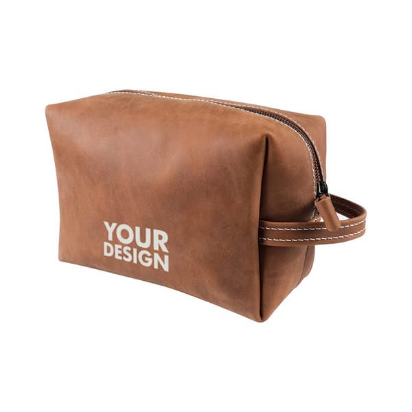 A brown PU leather cosmetic bag with a zip closure and a handle, featuring a branding logo. PU Leather Cosmetic Bag - Image 1