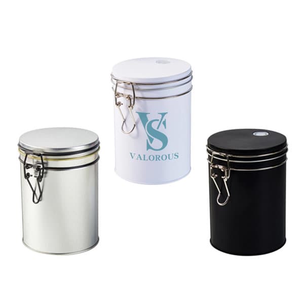 Three tinplate coffee containers in black, white, and metallic silver, each with a secure lid and branding. Tinplate Coffee Container - Image 1