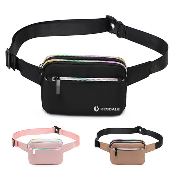 A black fanny pack with adjustable belt, featuring multiple zippered compartments, shown alongside pink and beige variants. Fanny Pack With Adjustable Belt - Image 1
