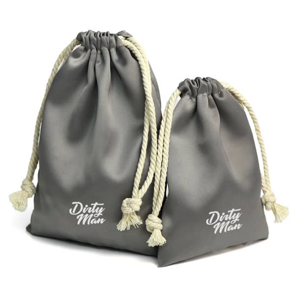 Two grey satin drawstring bags with cream-coloured cords, featuring a logo on the front of each bag. Satin Dust Bag - Image 1