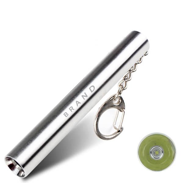 A metallic silver mini flashlight with a keychain attachment and a green light at the end. Mini Jewelry Identification Flashlight - Image 1