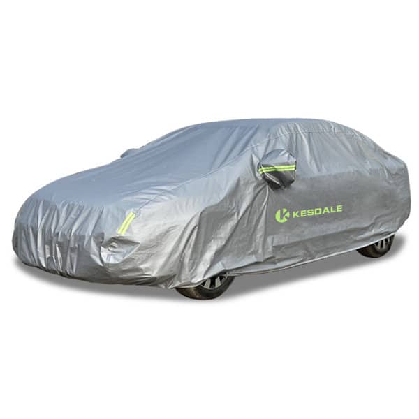 A grey PEVA waterproof car cover fits a vehicle, featuring a logo on the side. PEVA Waterproof Car Cover - Image 1