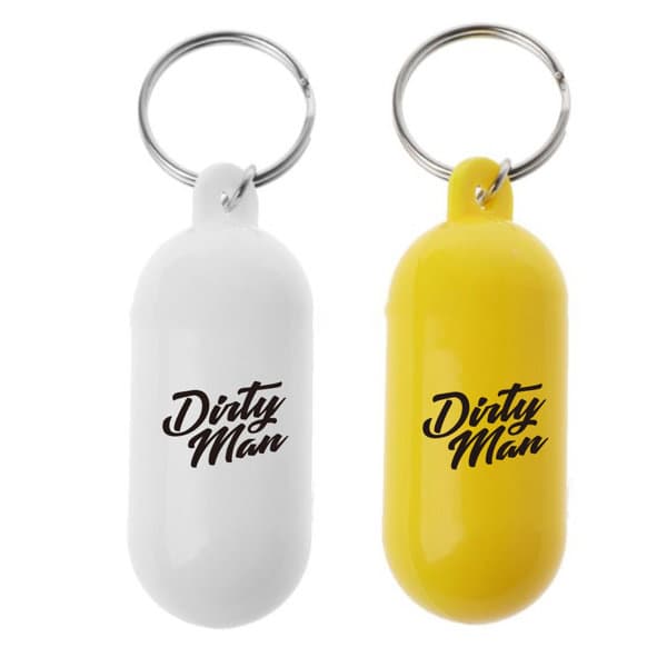 A pill-shaped beach floating keychain in white and yellow with a keyring. Features branding on the surface. Pill-shape Beach Floating Keychain - Image 1