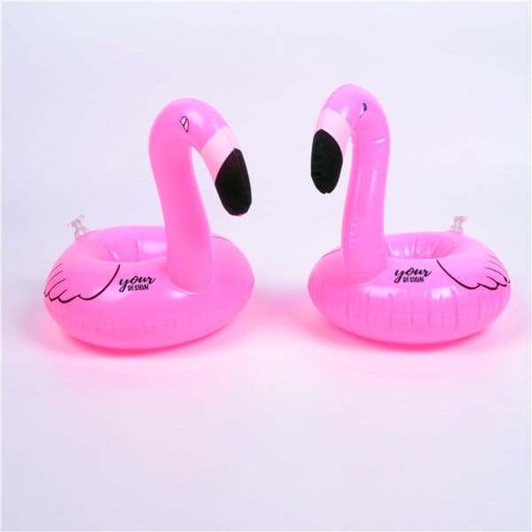 Two pink inflatable flamingo drink floats, featuring black beaks and a branding logo on each float. Flamingo Inflatable Drink Float - Image 1