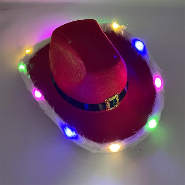 A bright red cowboy hat with a black band and multi-coloured lights around the brim. Light Up Giant Christmas Cowboy Hat - Image 1