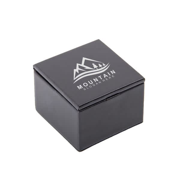 A black custom PU flip gift box featuring a logo on the top. The box is square-shaped with a smooth finish. Custom PU Flip Gift Box - Image 1