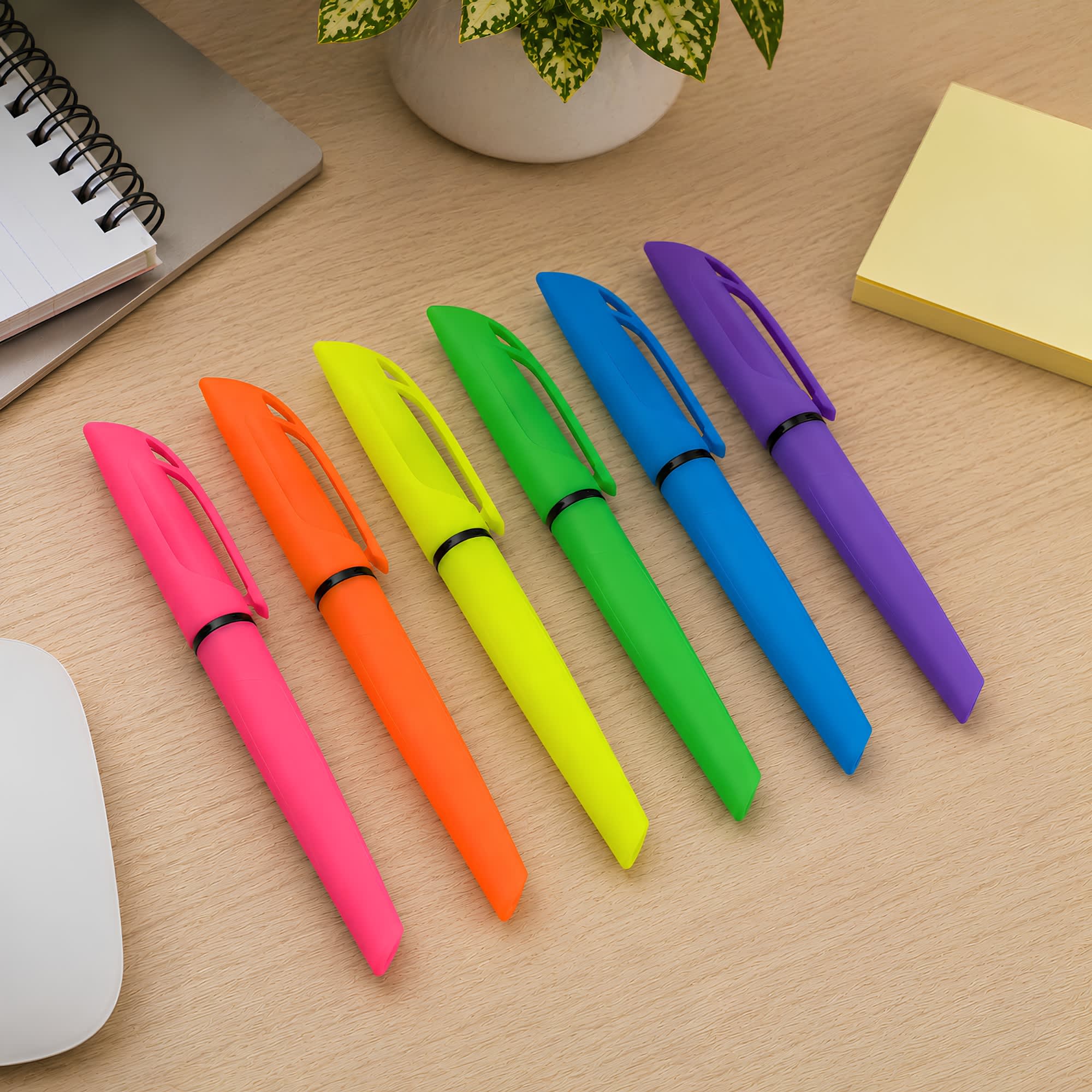 A set of six highlighter pens in bright pink, orange, yellow, green, blue, and purple, placed on a desk with stationery. Gear Pen Highlighter - Image 1