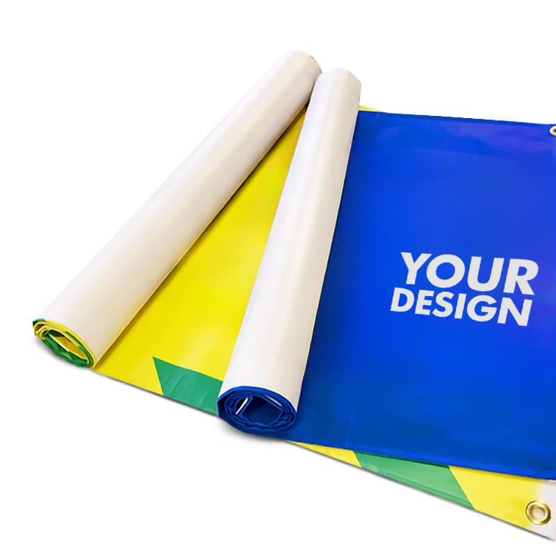 A custom fence banner featuring a blue and yellow design, with rolled edges and a logo. Custom Fence Banner - Image 1