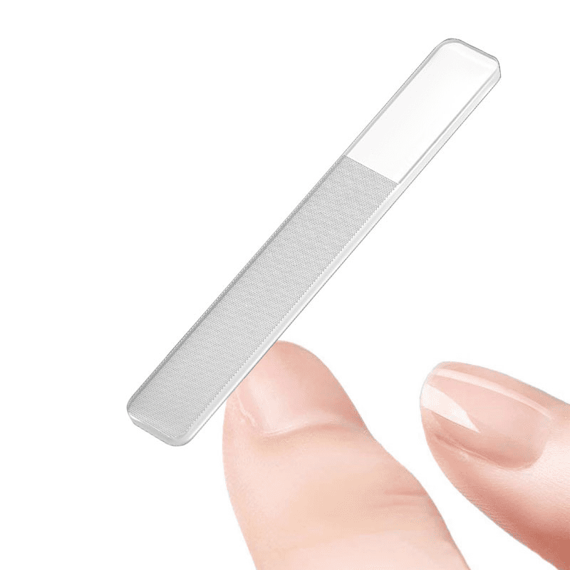 A custom nano nail file buffer with a smooth, transparent design, being held by a fingertip. Custom Nano Nail Files Buffers - Image 1