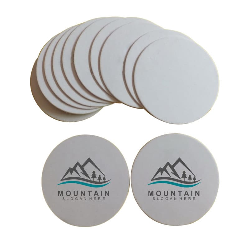 A stack of white custom disposable absorbent paper coasters, featuring a logo with mountains and text. Custom Disposable Absorbent Paper Coaster - Image 1