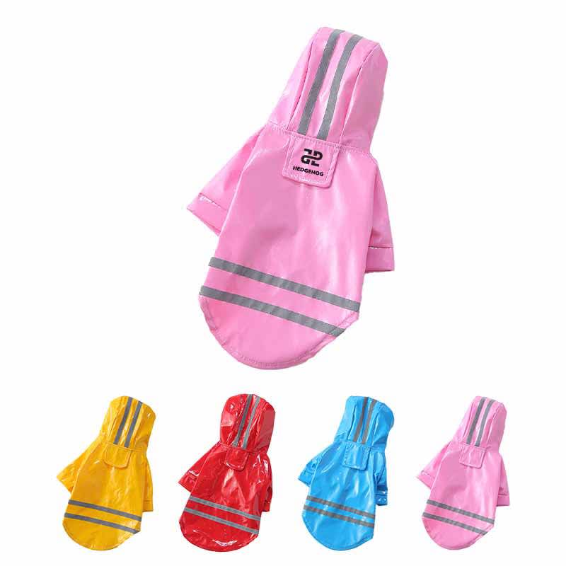 A pink reflective pet raincoat with additional jackets in yellow, red, and blue. The coat features reflective stripes and a logo. PU Reflective Pet Raincoat - Image 1