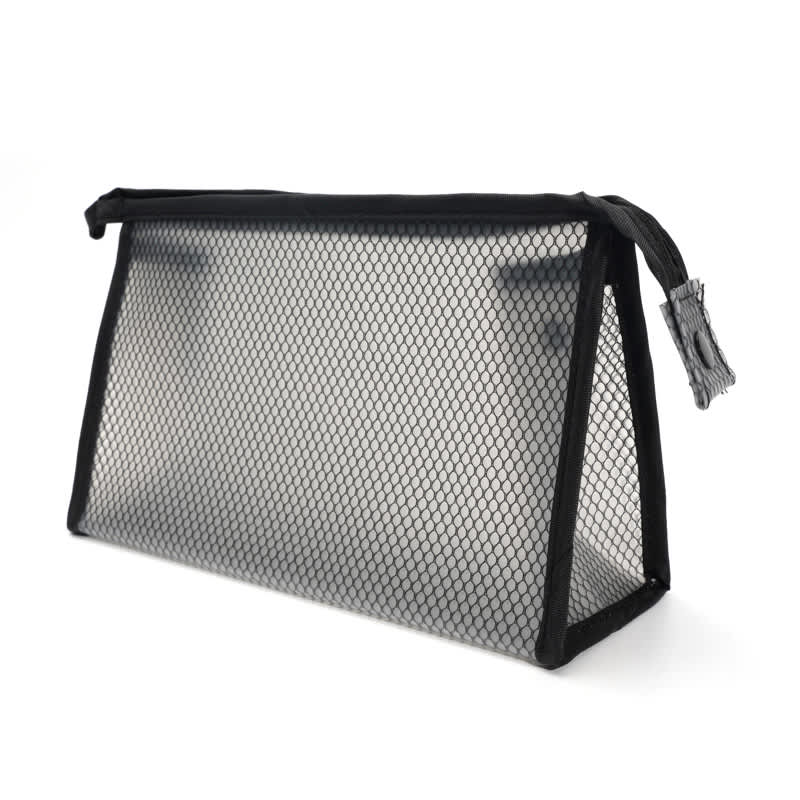 A transparent, black mesh makeup bag with a rectangular shape and a zip closure. It features a sturdy design for easy access. Clear Gridding EVA Makeup Bag - Image 1