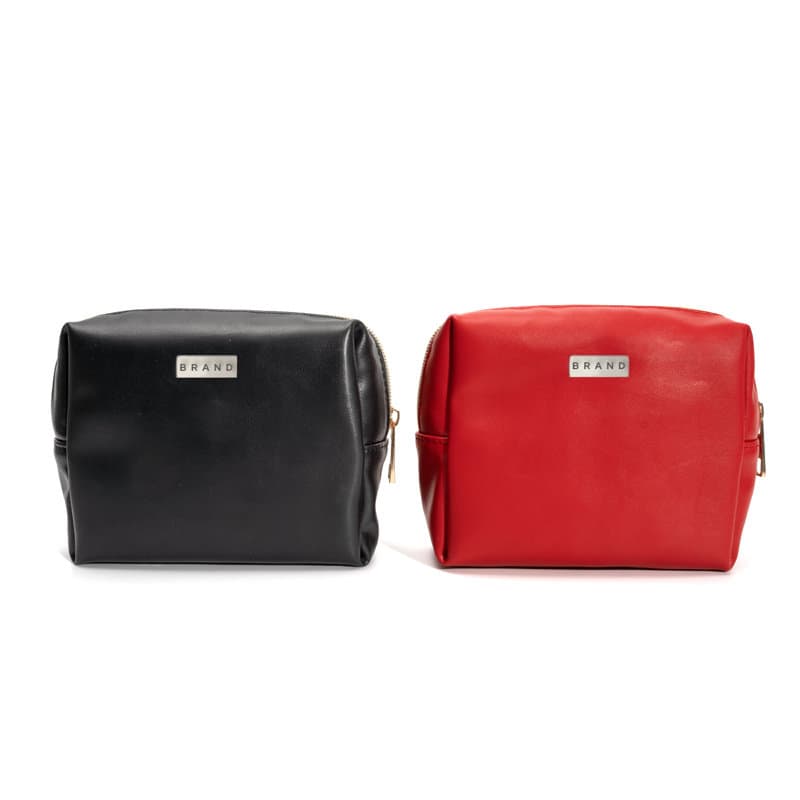 A black and a red PU leather makeup pouch feature a logo on the front. Both bags have zip closures. PU Leather Makeup Pouch - Image 1