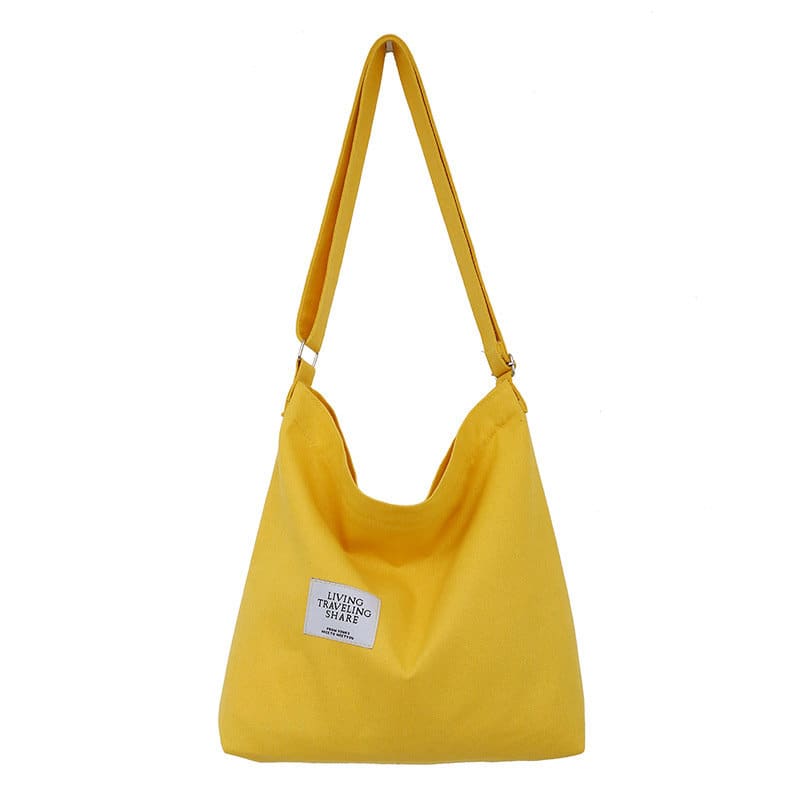 A yellow custom canvas shoulder bag featuring a single strap and a logo on the front. Custom Canvas Shoulder Bag - Image 1