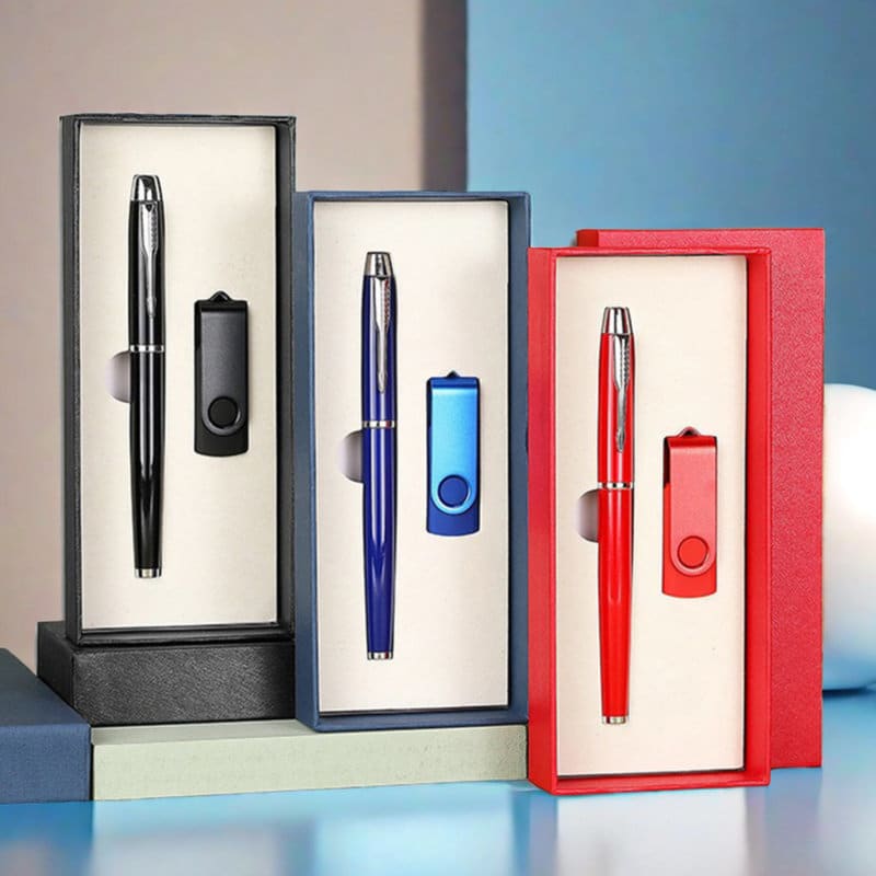 A set of ballpoint pens and USB flash drives in black, blue, and red, presented in stylish boxes. Ballpoint Pen And USB Flash Drive Set - Image 1