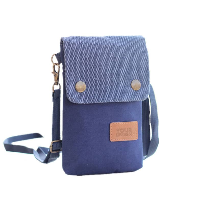 A navy blue canvas mobile phone shoulder bag with a denim-style flap and a detachable strap. Features a logo patch. Canvas Mobile Phone Shoulder Bag - Image 1