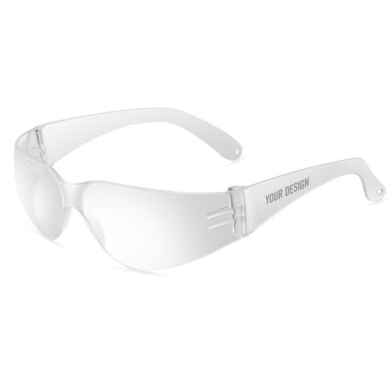 Clear safety glasses with a transparent frame and tinted lenses, featuring a logo on the side. Clear Safety Glasses - Image 1